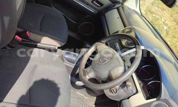 Buy Used Mazda Verisa Red Car in Lilongwe in Malawi Buy Used Mazda Verisa Red Car in Lilongwe in Malawi