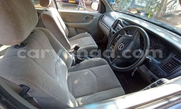 Buy Used Mazda Tribute Blue Car in Chilumba in Karonga Buy Used Mazda Tribute Blue Car in Chilumba in Karonga