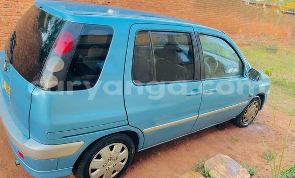Buy Used Toyota Raum Blue Car in Chipoka in Dedza Buy Used Toyota Raum Blue Car in Chipoka in Dedza