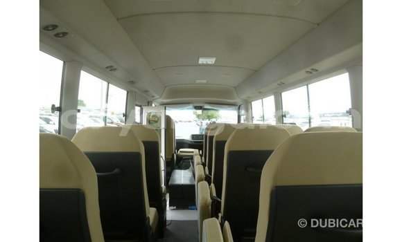 Acheter Import Voiture Toyota Coaster Blanc à Import - Dubai, Malawi Acheter Import Voiture Toyota Coaster Blanc à Import - Dubai, Malawi