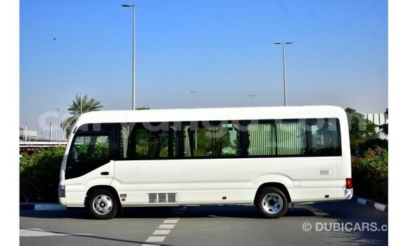 Nunua Imported Toyota Coaster White Gari ndani ya Import - Dubai nchini Malawi Nunua Imported Toyota Coaster White Gari ndani ya Import - Dubai nchini Malawi