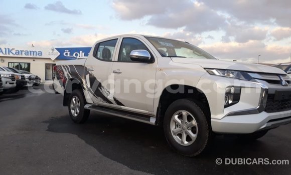 Buy Import Mitsubishi L200 White Car in Import - Dubai in Malawi Buy Import Mitsubishi L200 White Car in Import - Dubai in Malawi