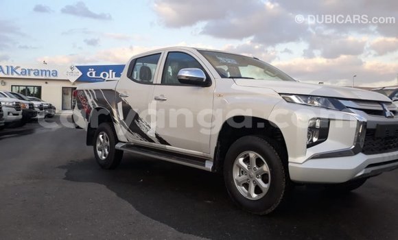 Buy Import Mitsubishi L200 White Car in Import - Dubai in Malawi Buy Import Mitsubishi L200 White Car in Import - Dubai in Malawi