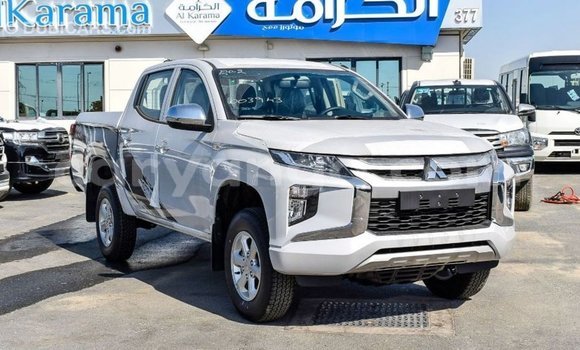 Buy Import Mitsubishi L200 White Car in Import - Dubai in Malawi Buy Import Mitsubishi L200 White Car in Import - Dubai in Malawi