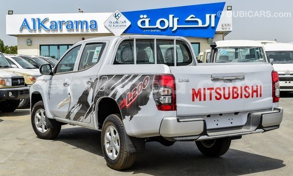 Buy Import Mitsubishi L200 White Car in Import - Dubai in Malawi Buy Import Mitsubishi L200 White Car in Import - Dubai in Malawi