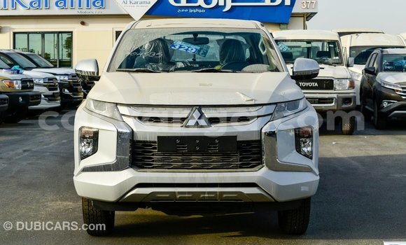 Buy Import Mitsubishi L200 White Car in Import - Dubai in Malawi Buy Import Mitsubishi L200 White Car in Import - Dubai in Malawi