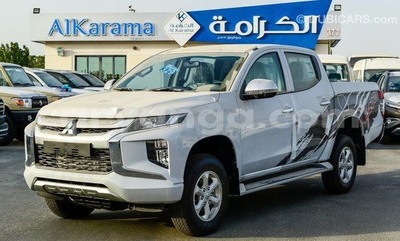 Buy Import Mitsubishi L200 White Car in Import - Dubai in Malawi Buy Import Mitsubishi L200 White Car in Import - Dubai in Malawi