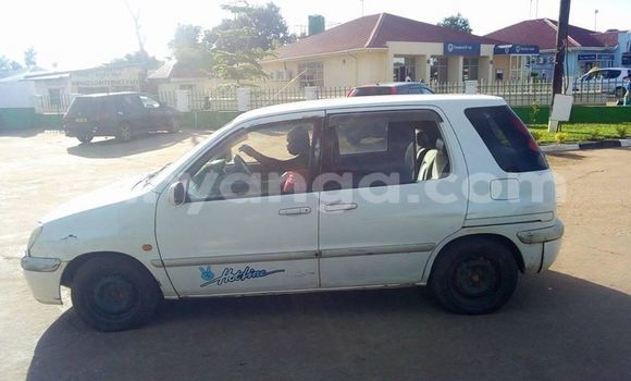 Buy Used Toyota Raum White Car in Lilongwe in Malawi Buy Used Toyota Raum White Car in Lilongwe in Malawi