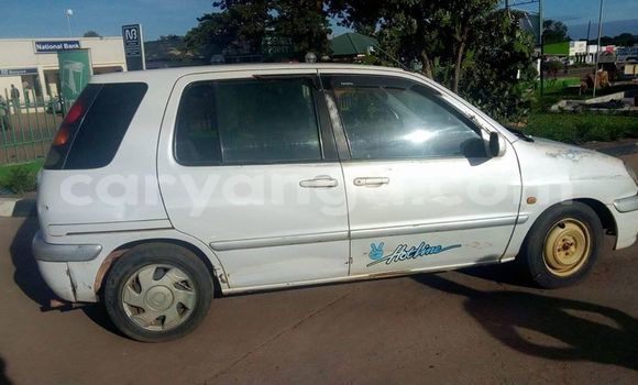 Buy Used Toyota Raum White Car in Lilongwe in Malawi Buy Used Toyota Raum White Car in Lilongwe in Malawi
