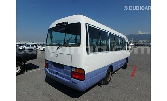 Acheter Import Voiture Toyota Coaster Blanc à Import - Dubai, Malawi Acheter Import Voiture Toyota Coaster Blanc à Import - Dubai, Malawi