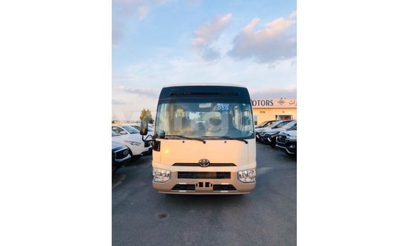 Acheter Import Voiture Toyota Coaster Blanc à Import - Dubai, Malawi Acheter Import Voiture Toyota Coaster Blanc à Import - Dubai, Malawi