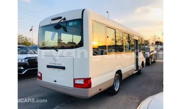 Nunua Imported Toyota Coaster White Gari ndani ya Import - Dubai nchini Malawi Nunua Imported Toyota Coaster White Gari ndani ya Import - Dubai nchini Malawi