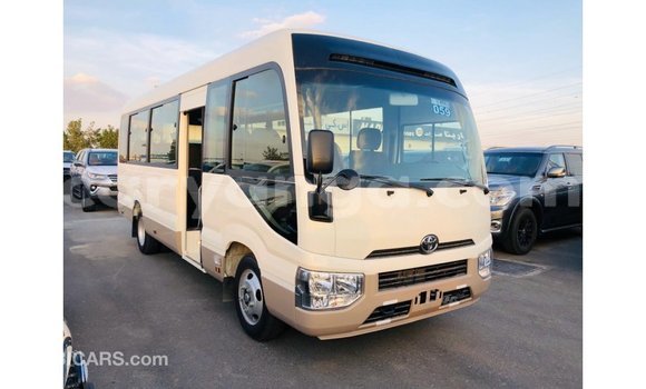 Nunua Imported Toyota Coaster White Gari ndani ya Import - Dubai nchini Malawi Nunua Imported Toyota Coaster White Gari ndani ya Import - Dubai nchini Malawi