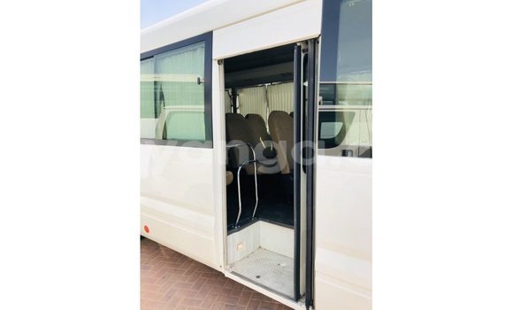 Acheter Import Voiture Toyota Coaster Blanc à Import - Dubai, Malawi Acheter Import Voiture Toyota Coaster Blanc à Import - Dubai, Malawi