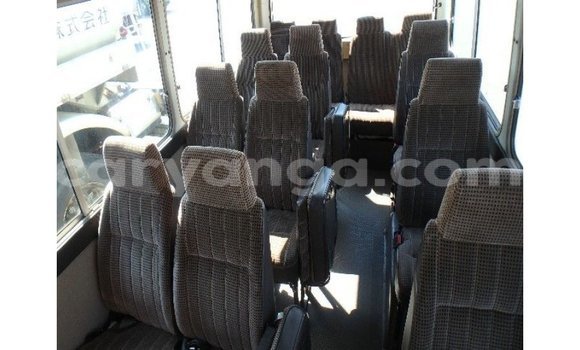Nunua Imported Toyota Coaster White Gari ndani ya Import - Dubai nchini Malawi Nunua Imported Toyota Coaster White Gari ndani ya Import - Dubai nchini Malawi