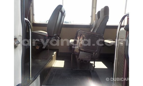 Nunua Imported Toyota Coaster White Gari ndani ya Import - Dubai nchini Malawi Nunua Imported Toyota Coaster White Gari ndani ya Import - Dubai nchini Malawi