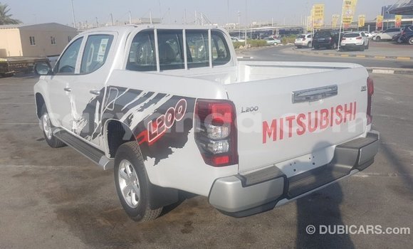 Buy Import Mitsubishi L200 White Car in Import - Dubai in Malawi Buy Import Mitsubishi L200 White Car in Import - Dubai in Malawi